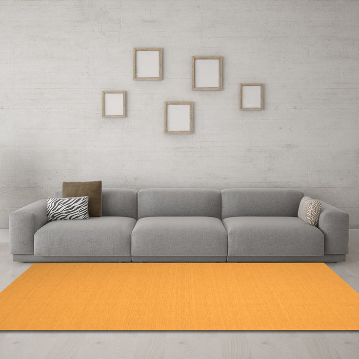 Machine Washable Solid Orange Modern Area Rugs in a Living Room, wshcon239org