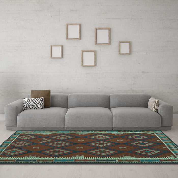 Machine Washable Oriental Light Blue Traditional Rug in a Living Room, wshcon2404lblu