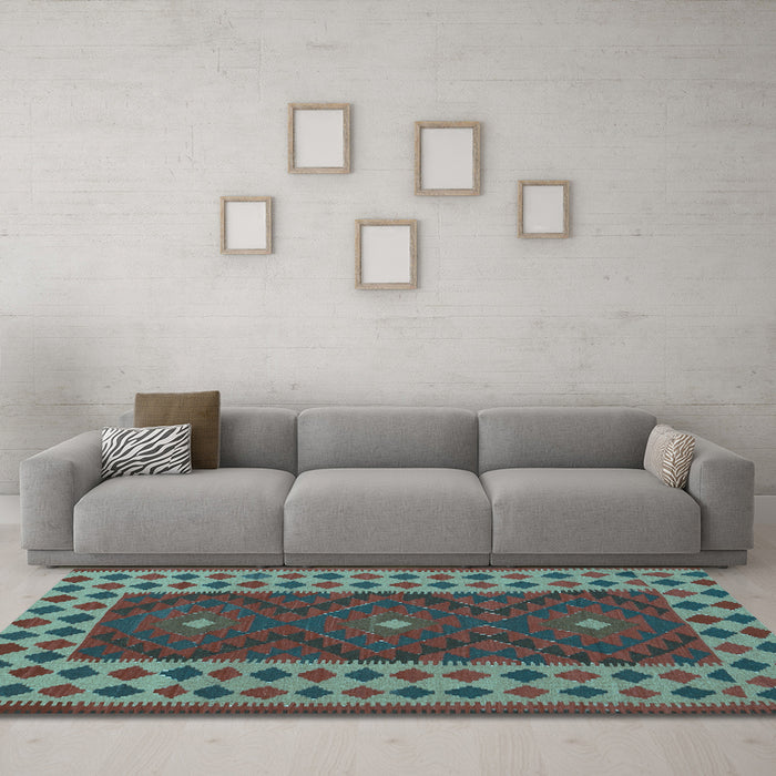 Machine Washable Oriental Light Blue Traditional Rug in a Living Room, wshcon2410lblu