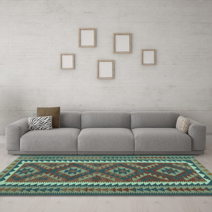 Machine Washable Oriental Light Blue Traditional Rug in a Living Room, wshcon2412lblu