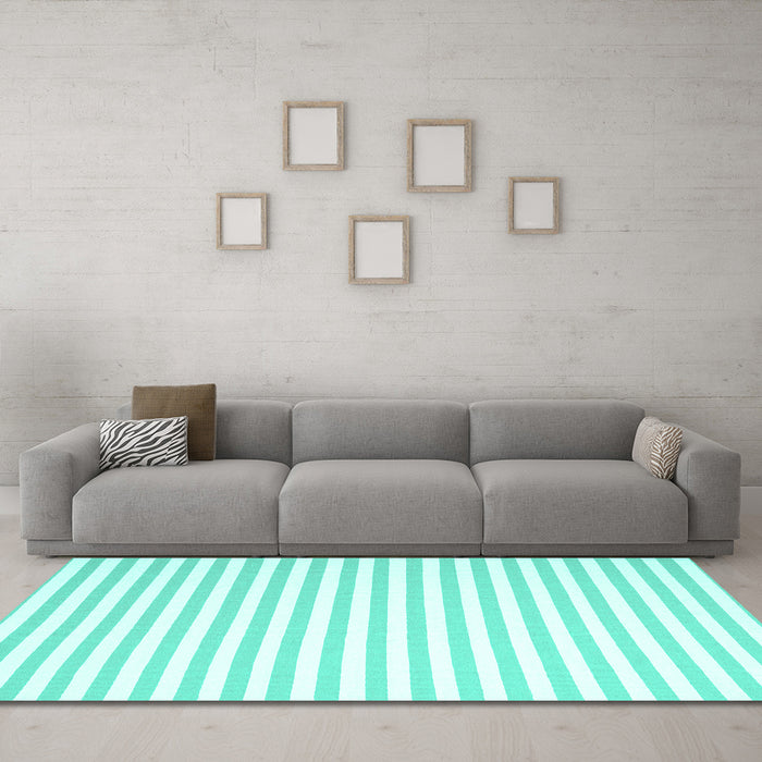 Machine Washable Solid Turquoise Modern Area Rugs in a Living Room,, wshcon2414turq