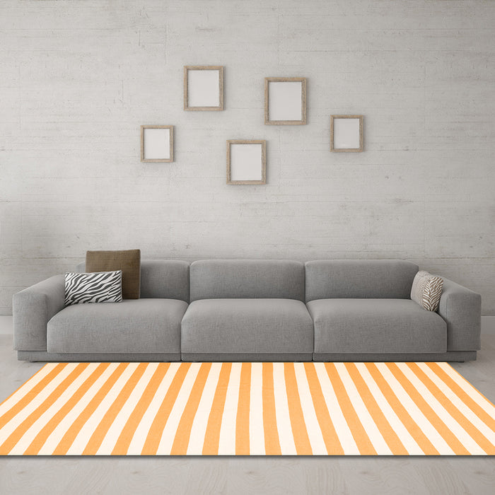 Machine Washable Solid Orange Modern Area Rugs in a Living Room, wshcon2414org