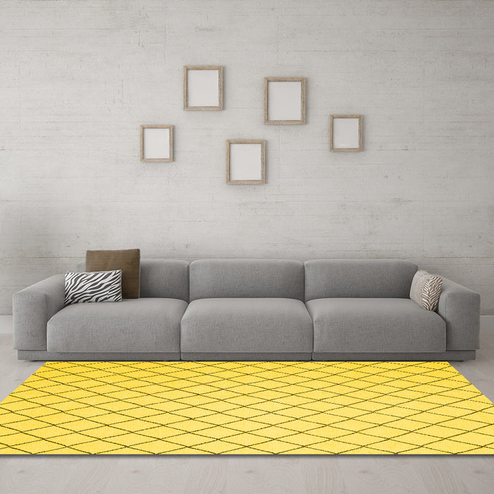 Machine Washable Solid Yellow Modern Rug in a Living Room, wshcon2415yw