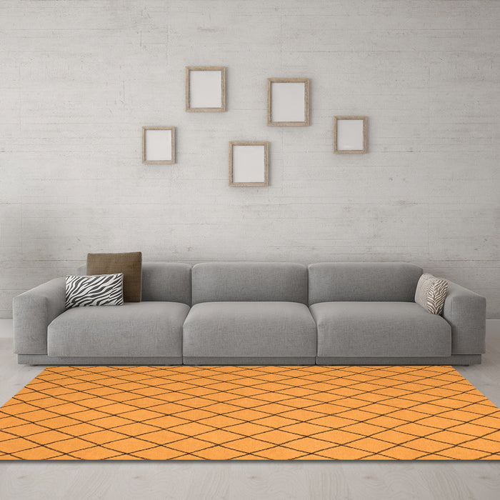 Machine Washable Solid Orange Modern Area Rugs in a Living Room, wshcon2417org