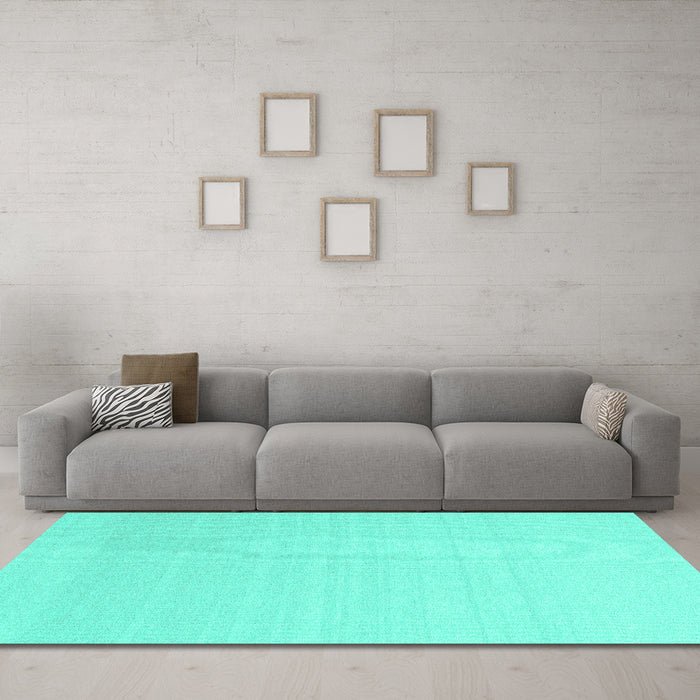 Machine Washable Solid Turquoise Modern Area Rugs in a Living Room,, wshcon2422turq