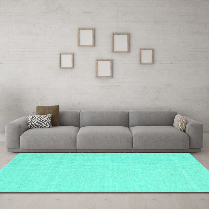 Machine Washable Solid Turquoise Modern Area Rugs in a Living Room,, wshcon2423turq