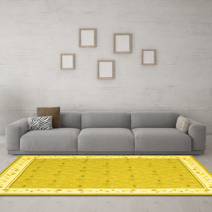 Machine Washable Abstract Yellow Contemporary Rug in a Living Room, wshcon2436yw