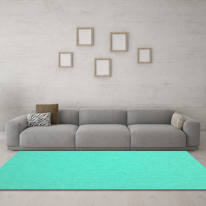 Machine Washable Solid Turquoise Modern Area Rugs in a Living Room,, wshcon243turq