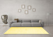 Machine Washable Solid Yellow Modern Rug in a Living Room, wshcon2443yw