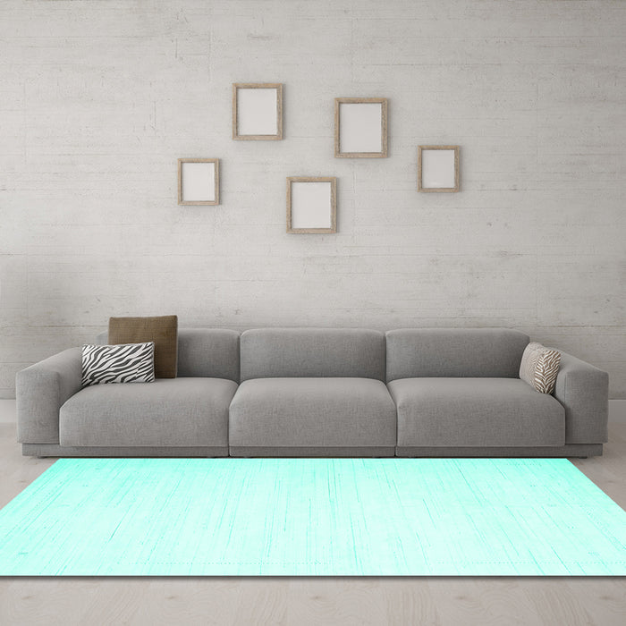 Machine Washable Solid Turquoise Modern Area Rugs in a Living Room,, wshcon2444turq