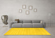 Machine Washable Solid Yellow Modern Rug in a Living Room, wshcon2446yw