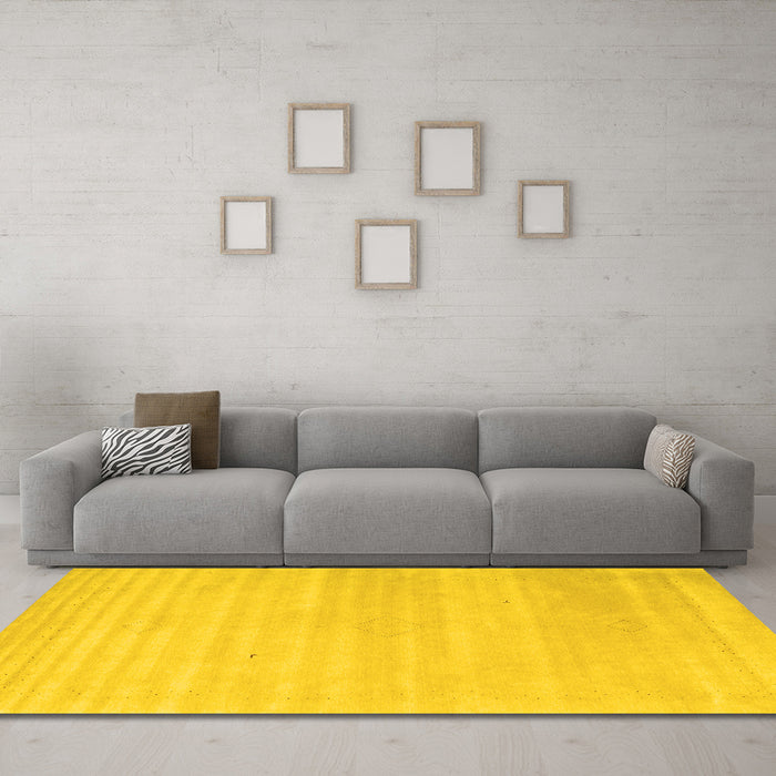 Machine Washable Solid Yellow Modern Rug in a Living Room, wshcon2446yw