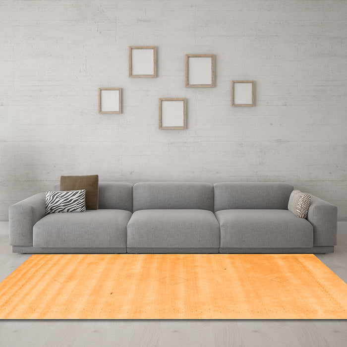 Machine Washable Solid Orange Modern Area Rugs in a Living Room, wshcon2446org