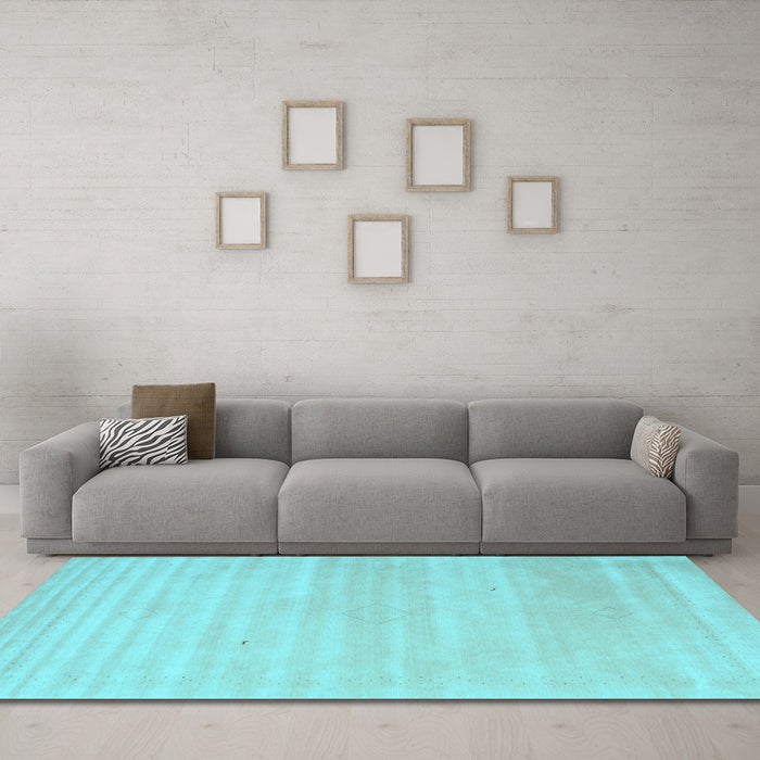 Machine Washable Solid Light Blue Modern Rug in a Living Room, wshcon2446lblu