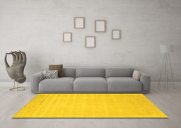 Machine Washable Solid Yellow Modern Rug in a Living Room, wshcon2453yw