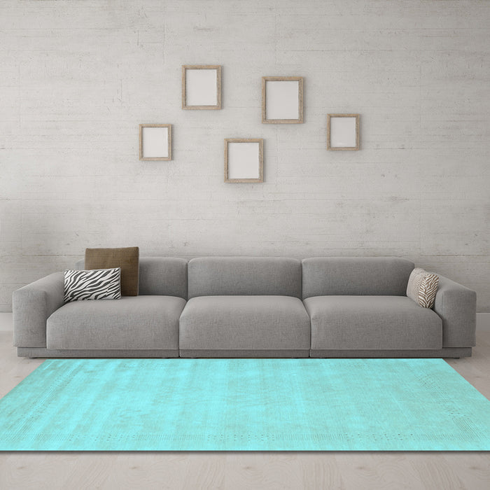 Machine Washable Solid Light Blue Modern Rug in a Living Room, wshcon2453lblu