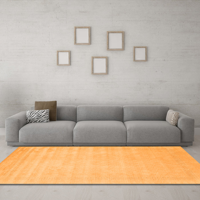 Machine Washable Solid Orange Modern Area Rugs in a Living Room, wshcon2453org