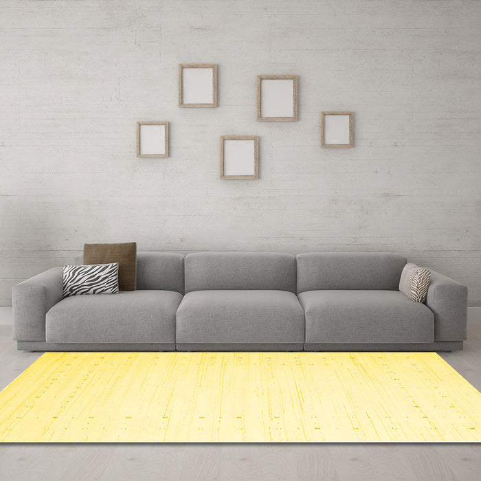 Machine Washable Solid Yellow Modern Rug in a Living Room, wshcon2454yw