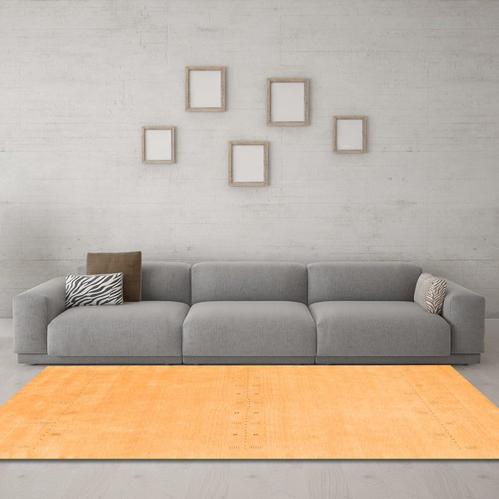 Machine Washable Solid Orange Modern Area Rugs in a Living Room, wshcon2457org