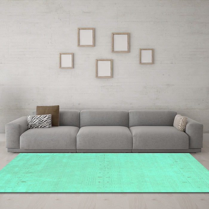 Machine Washable Solid Turquoise Modern Area Rugs in a Living Room,, wshcon2457turq