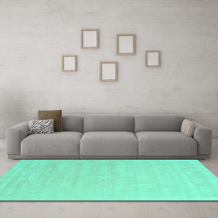 Machine Washable Solid Turquoise Modern Area Rugs in a Living Room,, wshcon2461turq