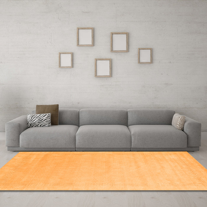 Machine Washable Solid Orange Modern Area Rugs in a Living Room, wshcon2462org