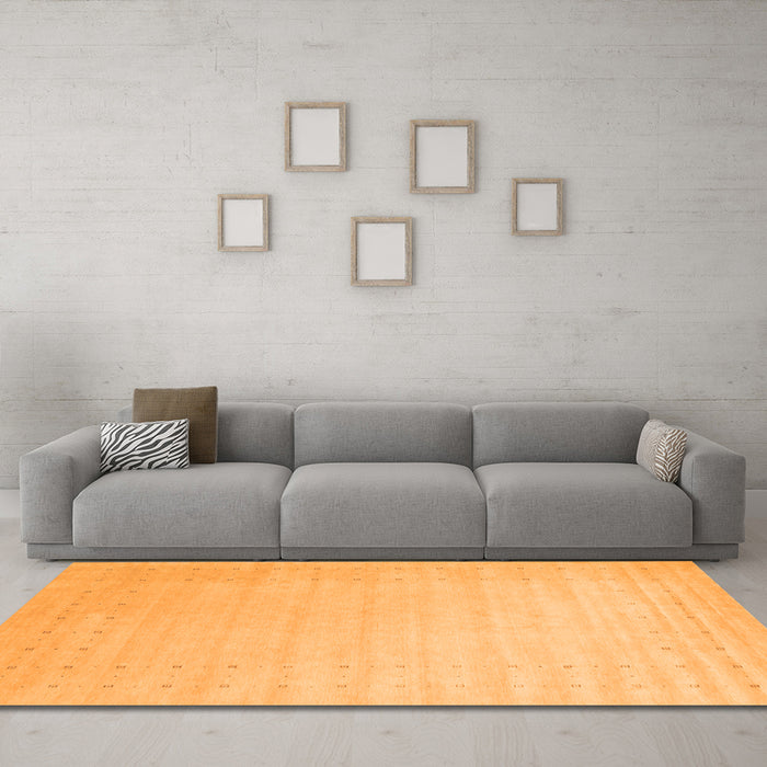Machine Washable Solid Orange Modern Area Rugs in a Living Room, wshcon2463org