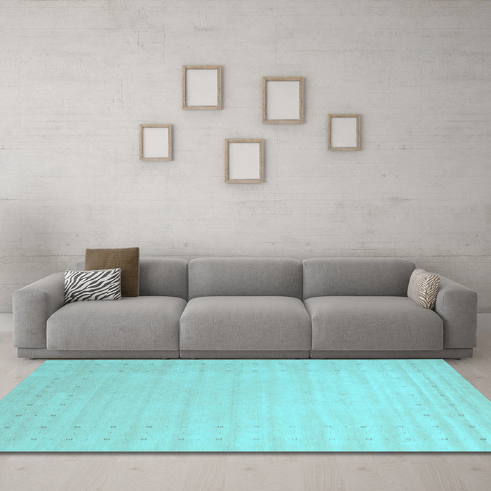 Machine Washable Solid Light Blue Modern Rug in a Living Room, wshcon2463lblu