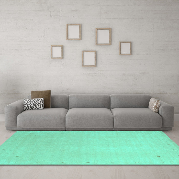 Machine Washable Solid Turquoise Modern Area Rugs in a Living Room,, wshcon2464turq