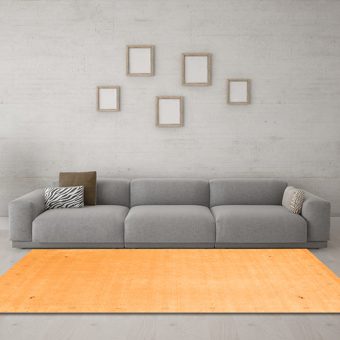 Machine Washable Solid Orange Modern Area Rugs in a Living Room, wshcon2464org