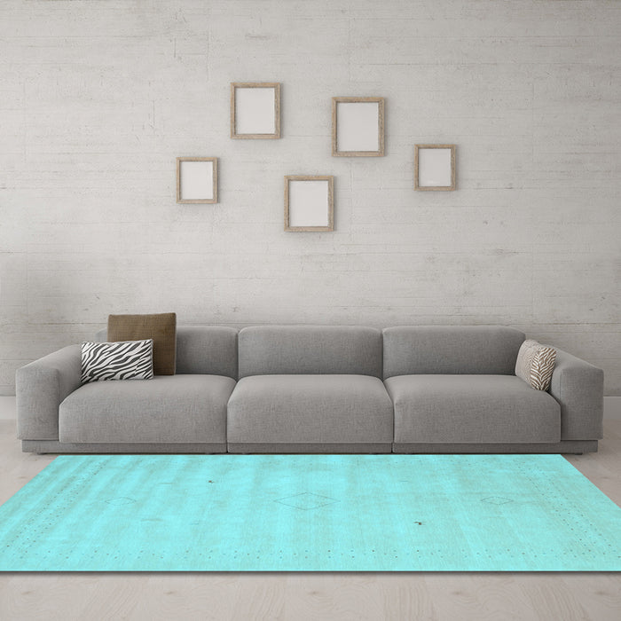 Machine Washable Solid Light Blue Modern Rug in a Living Room, wshcon2465lblu