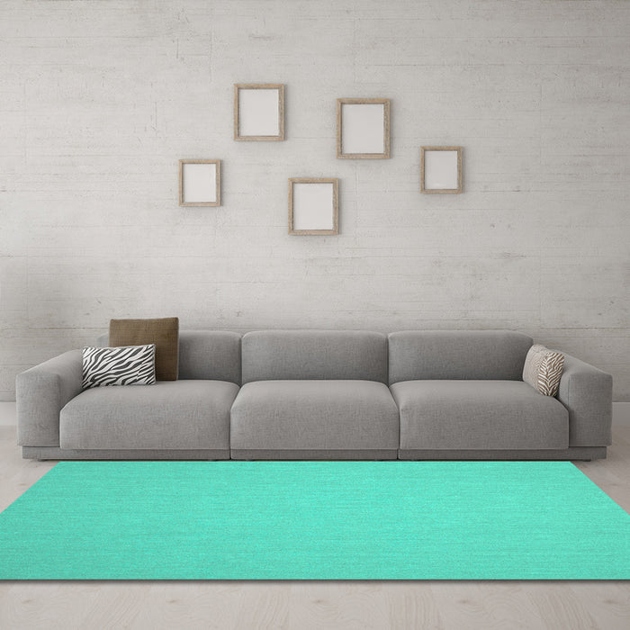 Machine Washable Solid Turquoise Modern Area Rugs in a Living Room,, wshcon246turq