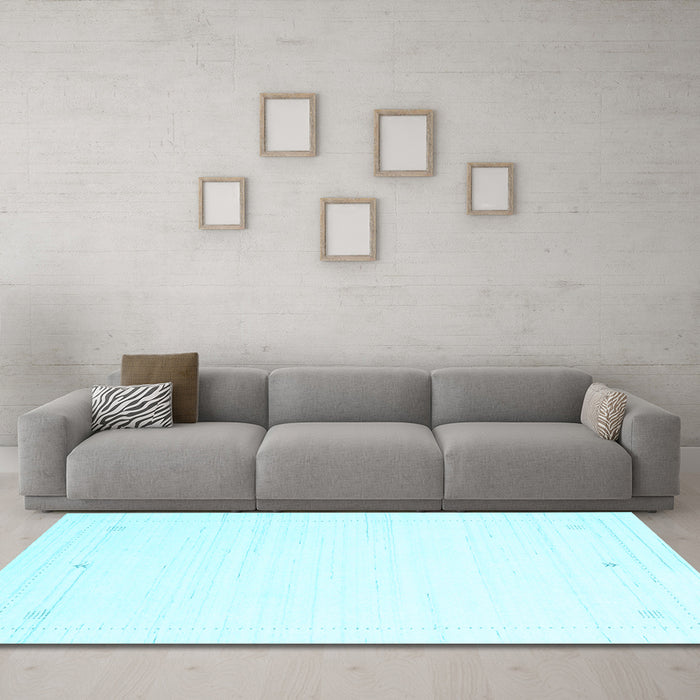 Machine Washable Solid Light Blue Modern Rug in a Living Room, wshcon2474lblu