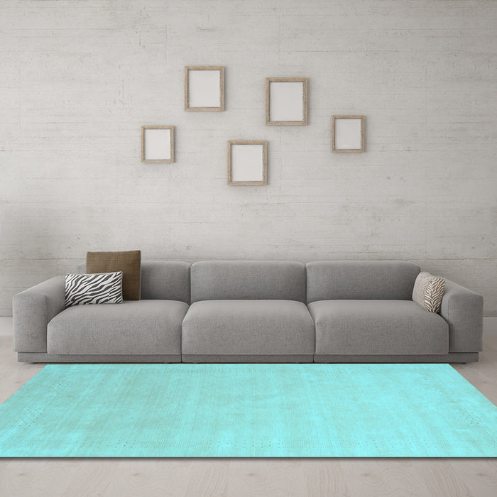Machine Washable Solid Light Blue Modern Rug in a Living Room, wshcon2478lblu