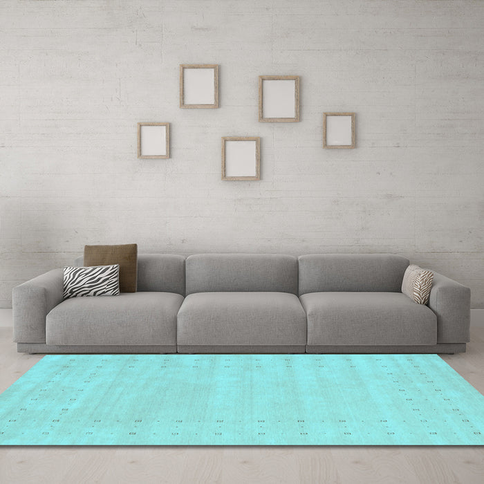 Machine Washable Solid Light Blue Modern Rug in a Living Room, wshcon2479lblu