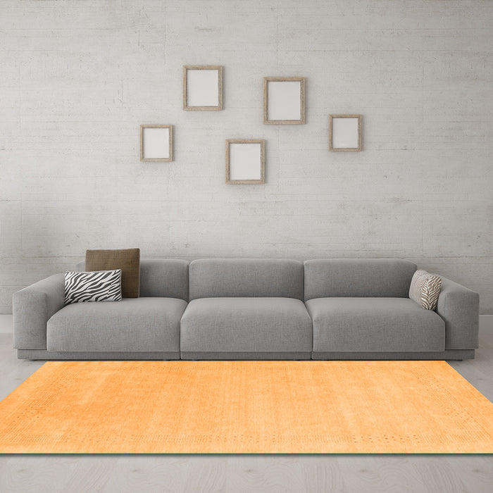 Machine Washable Solid Orange Modern Area Rugs in a Living Room, wshcon2480org