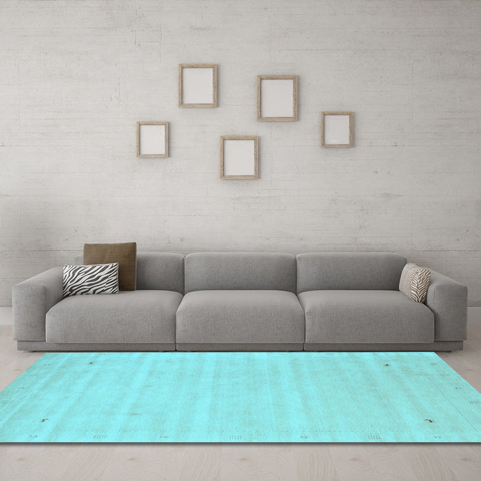 Machine Washable Solid Light Blue Modern Rug in a Living Room, wshcon2487lblu
