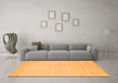 Machine Washable Solid Orange Modern Area Rugs in a Living Room, wshcon2487org