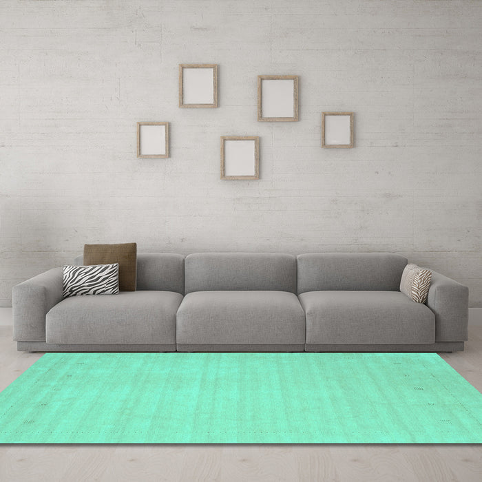 Machine Washable Solid Turquoise Modern Area Rugs in a Living Room,, wshcon2488turq