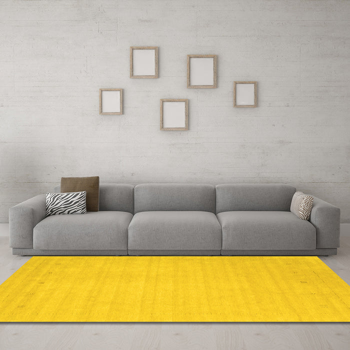 Machine Washable Solid Yellow Modern Rug in a Living Room, wshcon2488yw