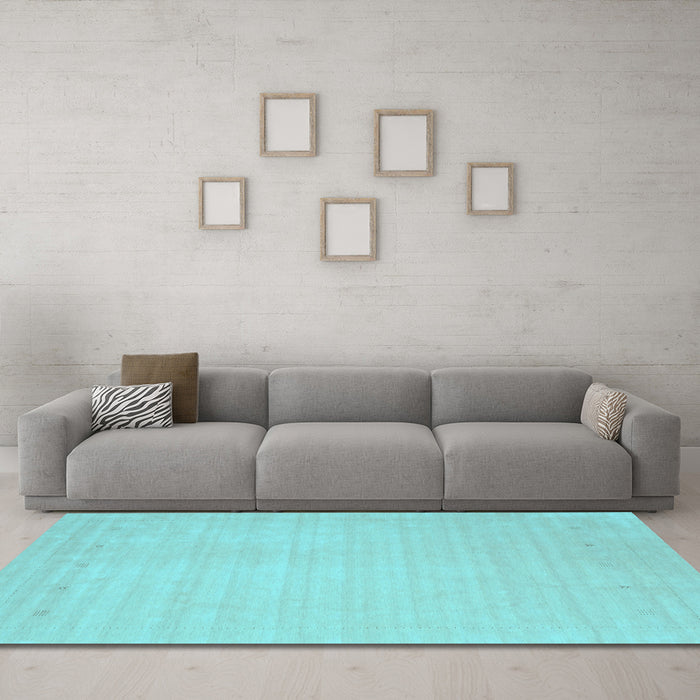 Machine Washable Solid Light Blue Modern Rug in a Living Room, wshcon2488lblu