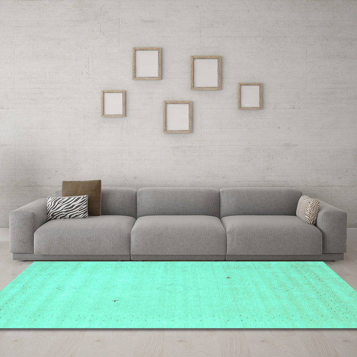 Machine Washable Solid Turquoise Modern Area Rugs in a Living Room,, wshcon2498turq