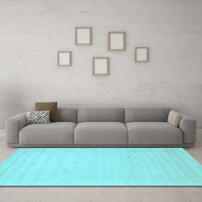 Machine Washable Solid Light Blue Modern Rug in a Living Room, wshcon2498lblu