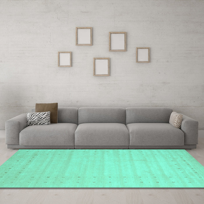 Machine Washable Solid Turquoise Modern Area Rugs in a Living Room,, wshcon2502turq