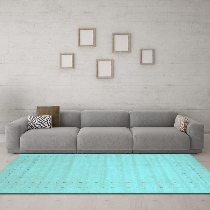 Machine Washable Solid Light Blue Modern Rug in a Living Room, wshcon2502lblu