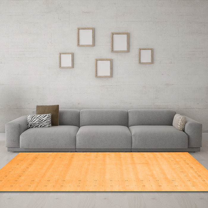 Machine Washable Solid Orange Modern Area Rugs in a Living Room, wshcon2502org