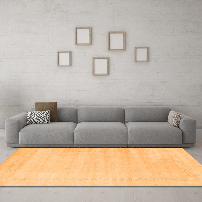Machine Washable Solid Orange Modern Area Rugs in a Living Room, wshcon2509org