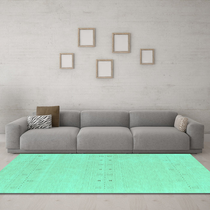 Machine Washable Solid Turquoise Modern Area Rugs in a Living Room,, wshcon2515turq