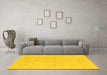 Machine Washable Solid Yellow Modern Rug in a Living Room, wshcon2515yw