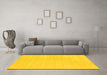 Machine Washable Solid Yellow Modern Rug in a Living Room, wshcon2516yw